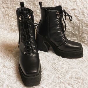 Koi from Dolls Kill Black Platform Boots